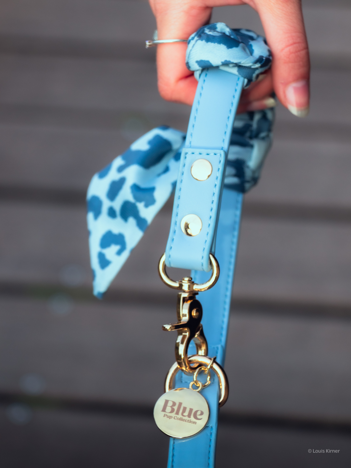Blue multiposition faux leather bandana holder