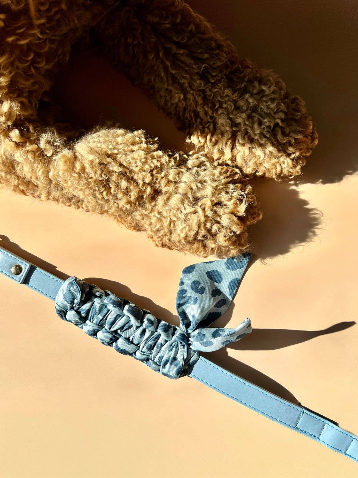 Blue multiposition faux leather bandana holder